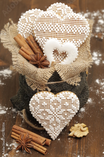 Christmas still life with honey-cake, cinnamon, badian, nuts and decorations (Canon EOS 5D Mark III, Canon EF 100mm F2.8 L IS USM Macro, 1/100, f11, ISO 400) photo