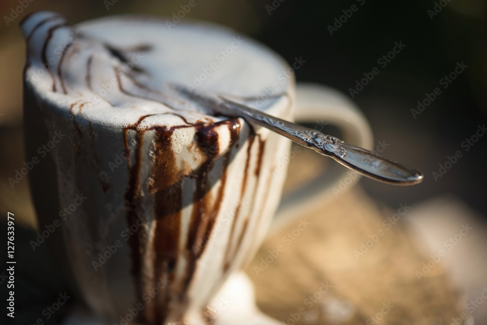Fototapeta premium Overflowing Hot Chocolate with Spoon