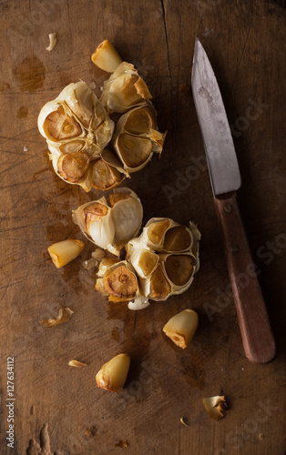 Roast Garlic on Rustic Wood Cutting Board