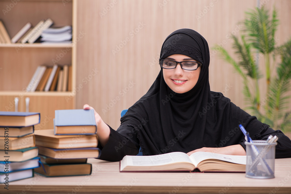 Woman muslim student preparing for exams Woman muslim student preparing for exams