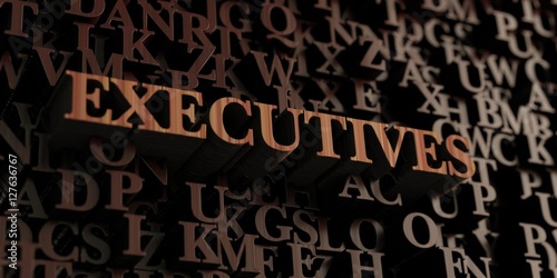 Executives - Wooden 3D rendered letters/message. Can be used for an online banner ad or a print postcard.