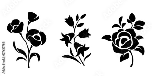 Fototapeta Naklejka Na Ścianę i Meble -  Three vector black silhouettes of flowers isolated on a white background.