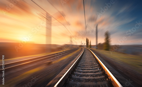 Photo Railroad in motion at sunset