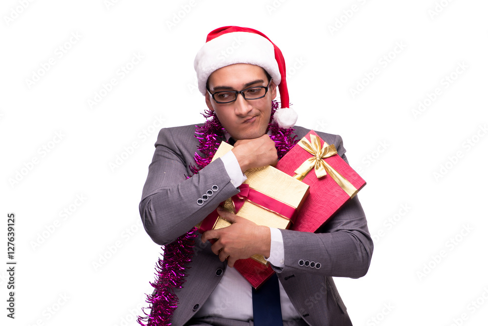 Young businessman celebrating christmas in office Young businessman celebrating christmas in office