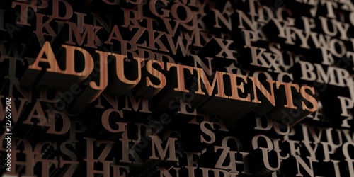 Adjustments - Wooden 3D rendered letters/message.  Can be used for an online banner ad or a print postcard. photo