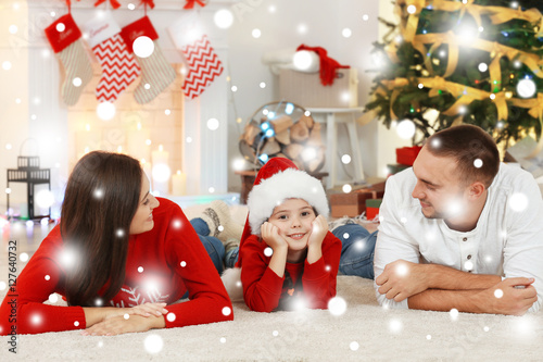 Happy family at room decora...