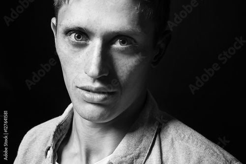 Black and white photo of handsome man © Africa Studio