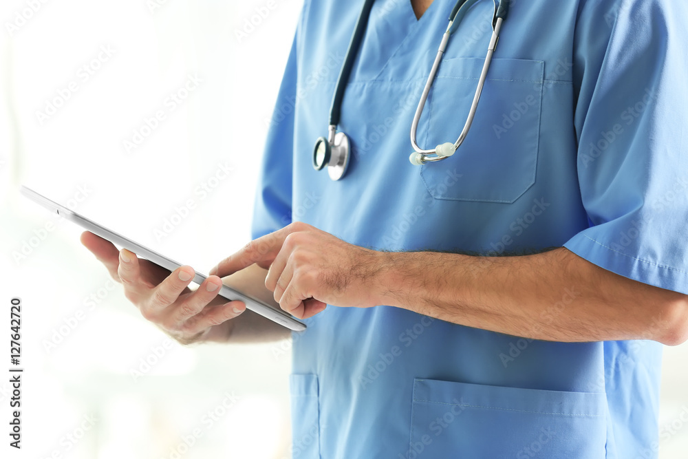 Doctor with tablet at hospital Doctor with tablet at hospital
