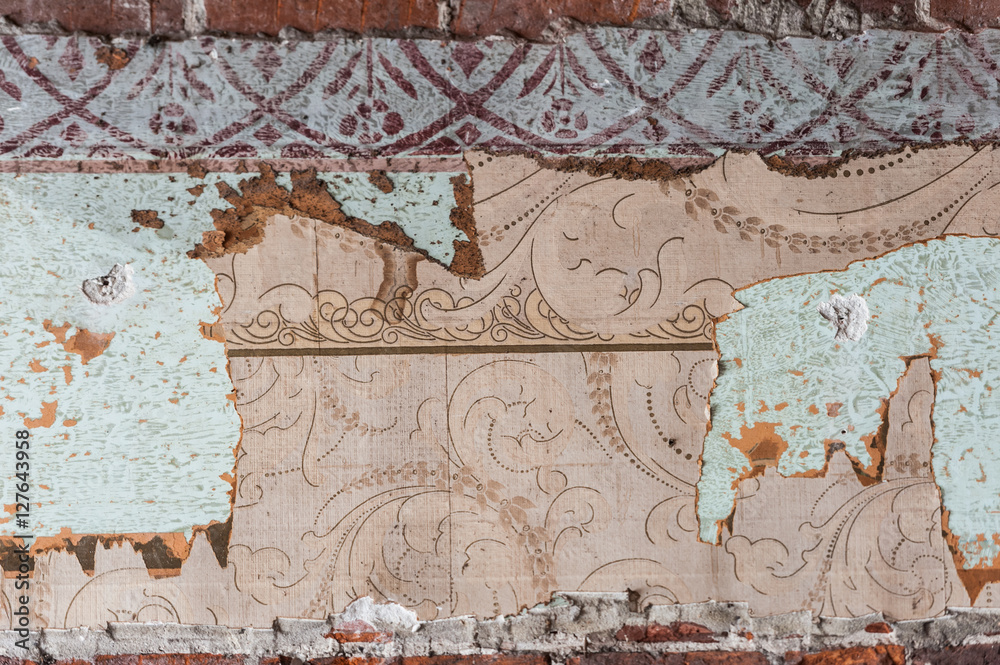 Fototapeta premium Vintage textures: old wallpaper, peeling paint, brick wall and layers of different colorful backgrounds.