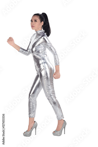Asian woman wearing silver latex suit