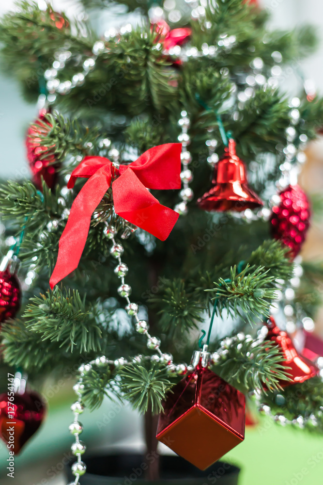 Christmas tree closeup with red decoration elegant hanging | celebration festivity xmas | home object vintage