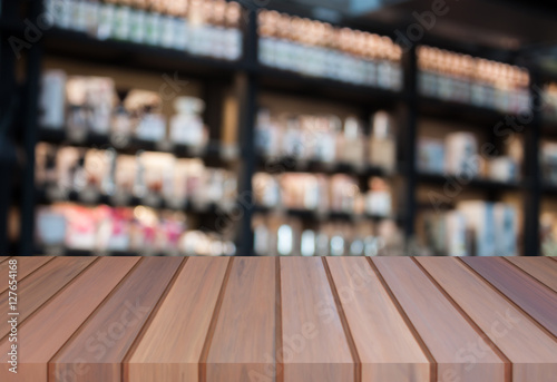 Perspective luxury brown wooden with blurred coffee shop backgro