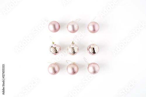 creative arrangement of bright christmas balls on white background. flat lay, top view