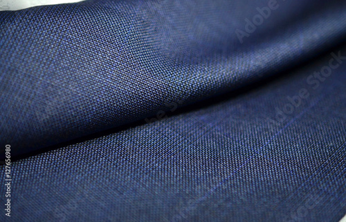 close up roll texture blue fabric of suit