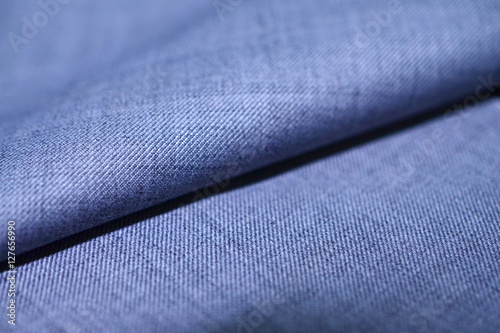 close up roll texture light blue fabric of suit