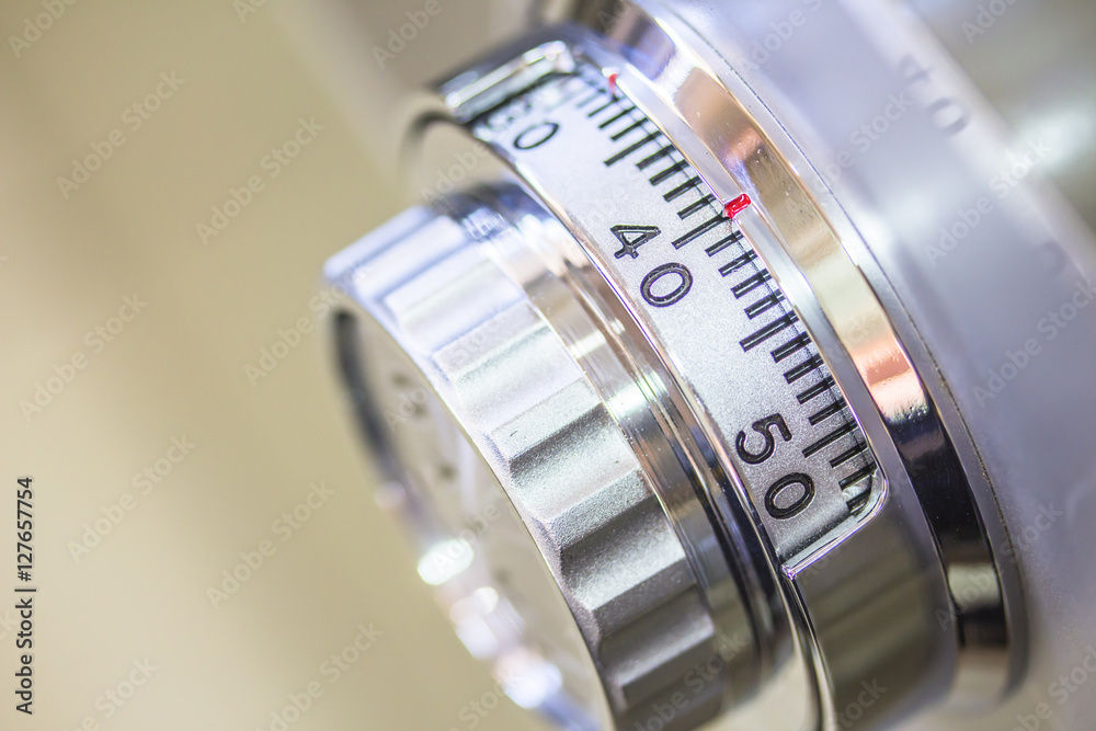 image of a combinations safe dial lock, close up image of a combinations safe dial lock, close up