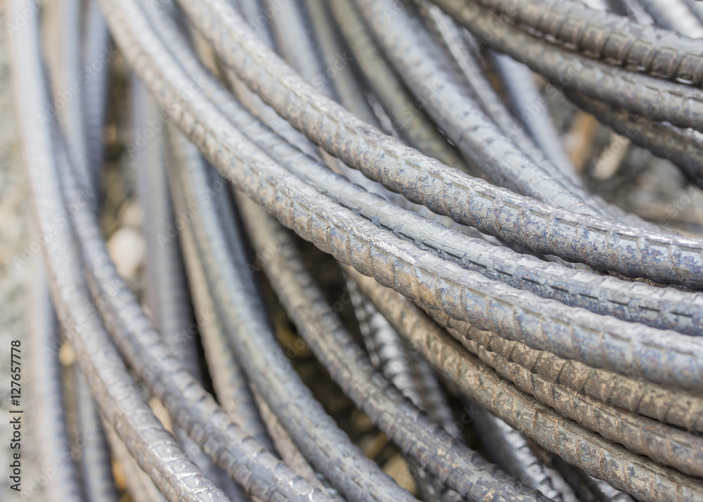 close up of Steel rods or bars used to reinforce concrete for construction, preparing to build a house close up of Steel rods or bars used to reinforce concrete for construction, preparing to build a house