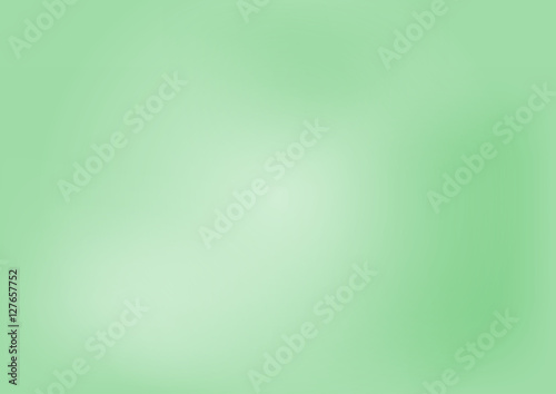 Abstract green background with light spots.