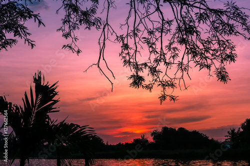 Silhouettes, sunsets River's Edge. Light and beauty of the sky at sunset.