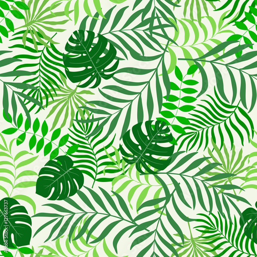 Tropical background with palm leaves. Seamless floral pattern © bell1982