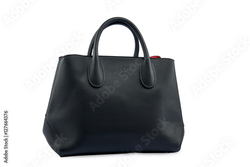 Black female leather bag isolated on white background.