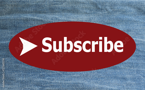 "Subscribe" on blurred jeans background