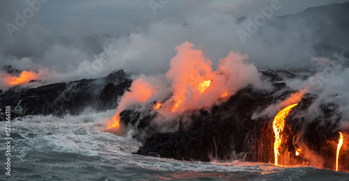 Molten lava flowing into the Pacific Ocean on Big Island of Hawa