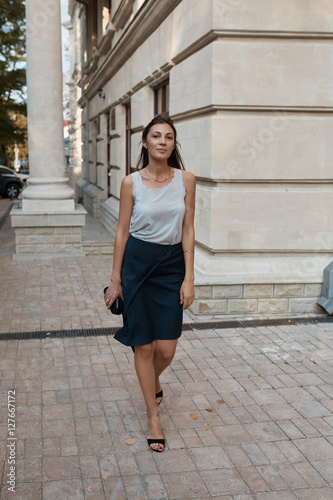 Fashion pretty woman walking through the streets of Old City © arthurhidden