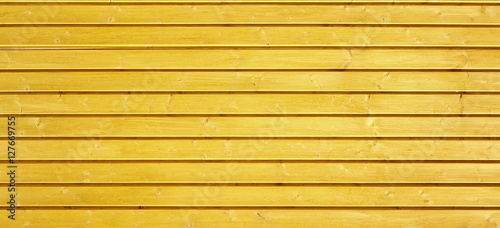 Painted Yellow Wood Shabby Background. Yellow Wooden Barn Wall T