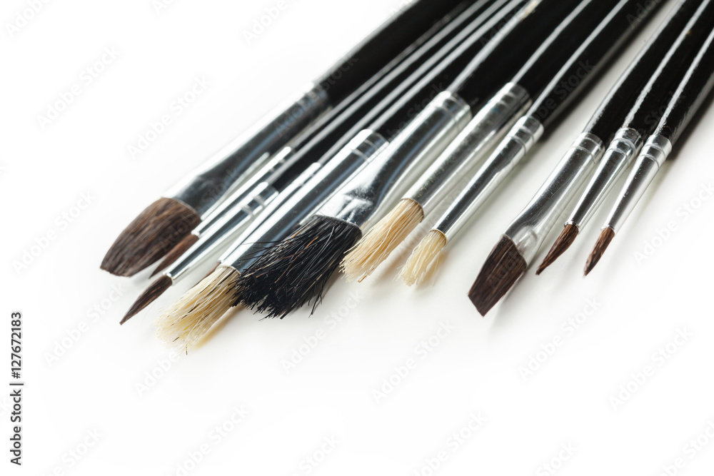 close up of paint brushes on white background close up of paint brushes on white background