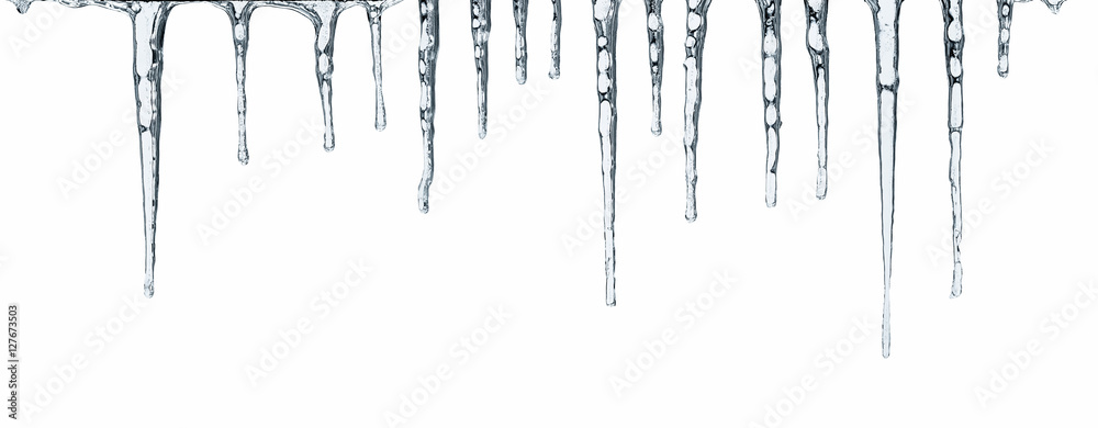 Obraz premium Close up of icicles isolated on white background