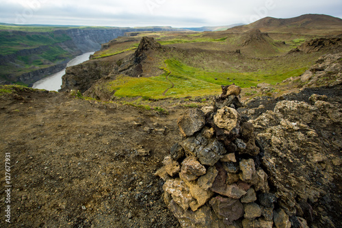 Stone Cairn in Dettifoss waterfall area, Iceland. © ale_koziura