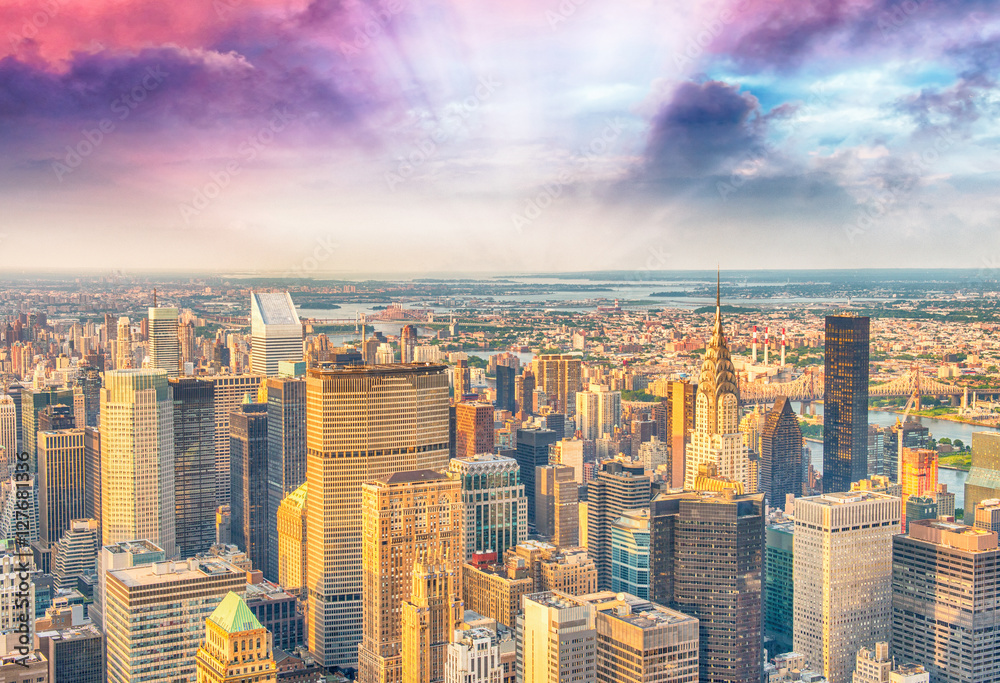 Obraz premium Lights of Manhattan at night, aerial view of New York City