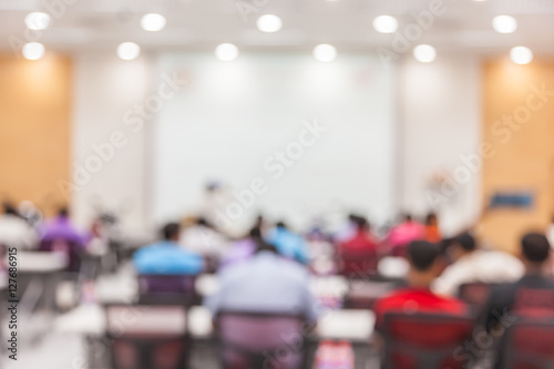 people lecture in seminar room