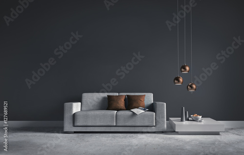 Sofa vor dunkelgrauer Wand photo