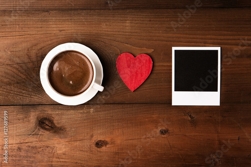 Cup coffee, wooden red heart and Retro Vintage empty Photo frames