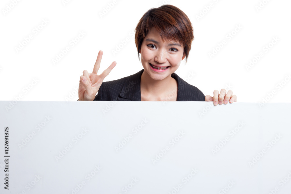 Young Asian woman show victory sign with blank sign. Young Asian woman show victory sign with blank sign.