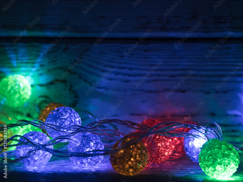 Christmas lights on rustic background Stock Photo | Adobe Stock