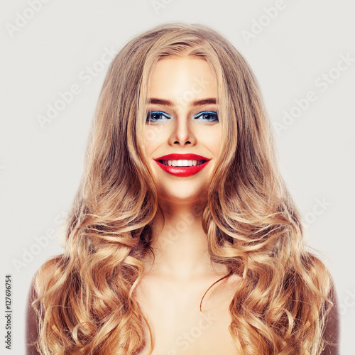 Beautiful Woman with Long Healthy Blonde Hair  Makeup and Cute S