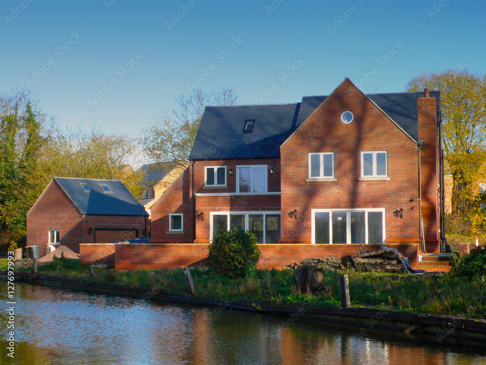 New build house on canal side UK New build house on canal side UK