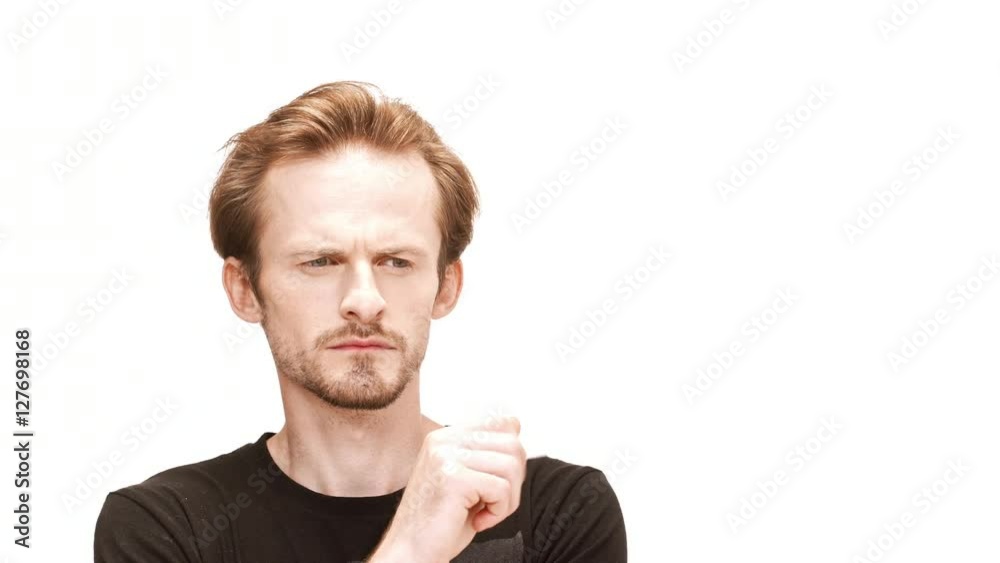 Young handsome man thinking, holding cigarette over white background. Young handsome man thinking, holding cigarette over white background.