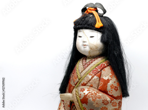 Japanese keisha doll on white background
