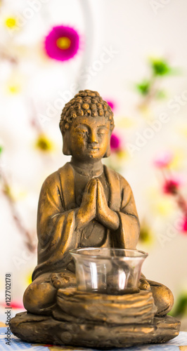 Beautiful buddha statue put the palms of the hands together in salute.  Buddha statue