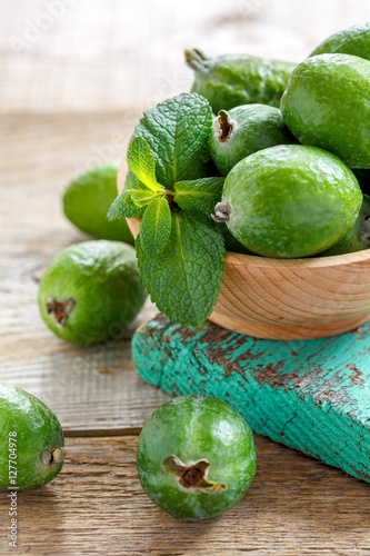 Feijoa fruit and green mint.
