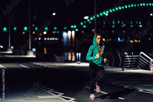 Jogging at night. Woman jogging at night