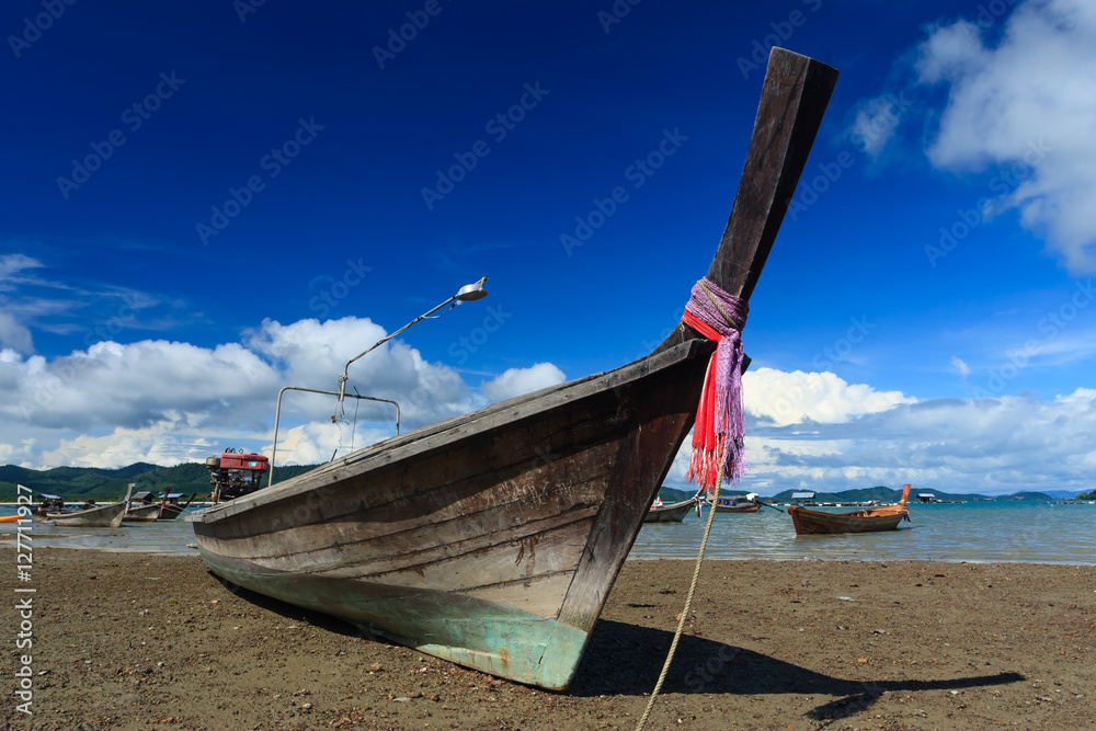 Long tail boat against blue sky, Koh Yao Noi , Phang Nga, THAILA Long tail boat against blue sky, Koh Yao Noi , Phang Nga, THAILA