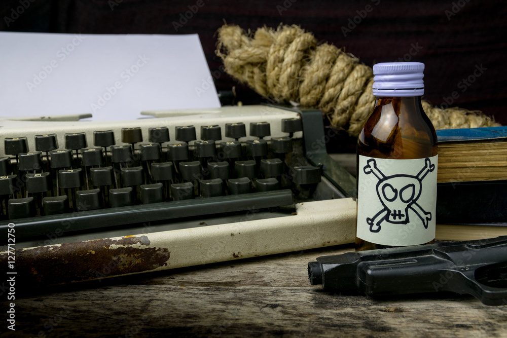 Typewriter with paper page and poison and gun. Concept writer Ro - obrazy, fototapety, plakaty 
