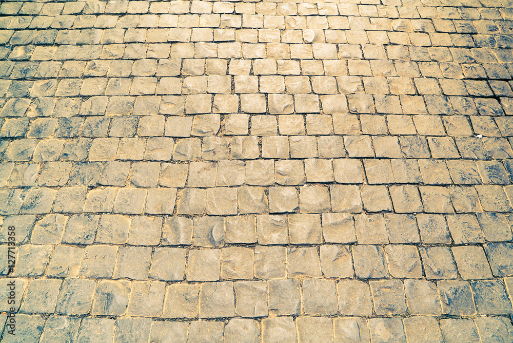 Pattern of brick pathway texture for background. Vintage filter
