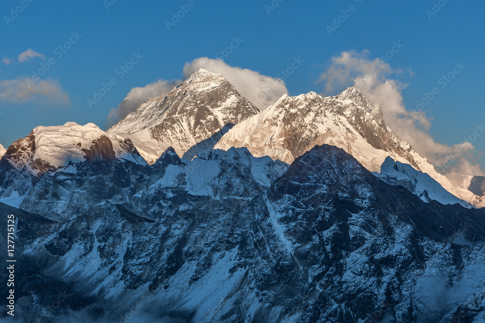 Mount Everest view from Gokyo Ri. Picturesque mountain summit scenery in the evening before sunset. Dramatic snowy peak of Everest, Sagarmatha National Park, Nepal, Himalayas.