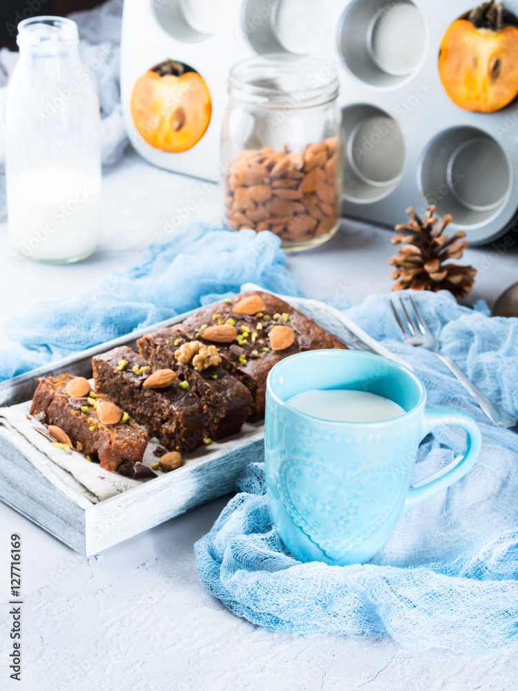 Cozy breakfast with chocolate cake and milk Cozy breakfast with chocolate cake and milk